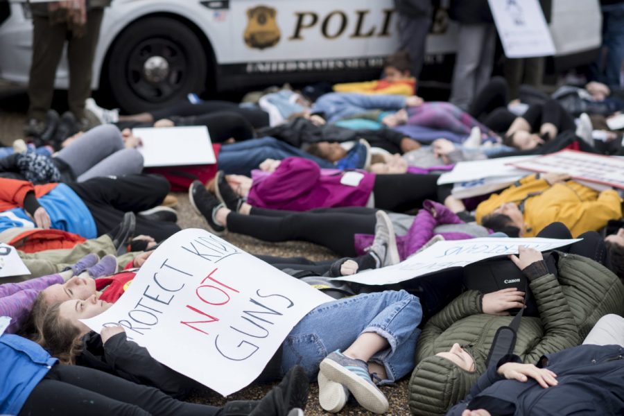 Washington, D.C., area students and supporters protest against gun violence with a lie-in outside of the White House on Monday, Feb. 19, 2018, after 17 people were killed in a shooting at Marjory Stoneman Douglas High School in Parkland, Fla., last week. (Photo By Bill Clark/CQ Roll Call)