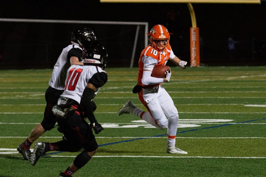 Quarterback Billy Osborne runs the ball against Kingsway