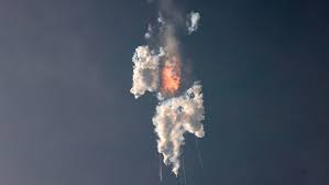 SpaceXs Starship exploding in midair shortly after launch.